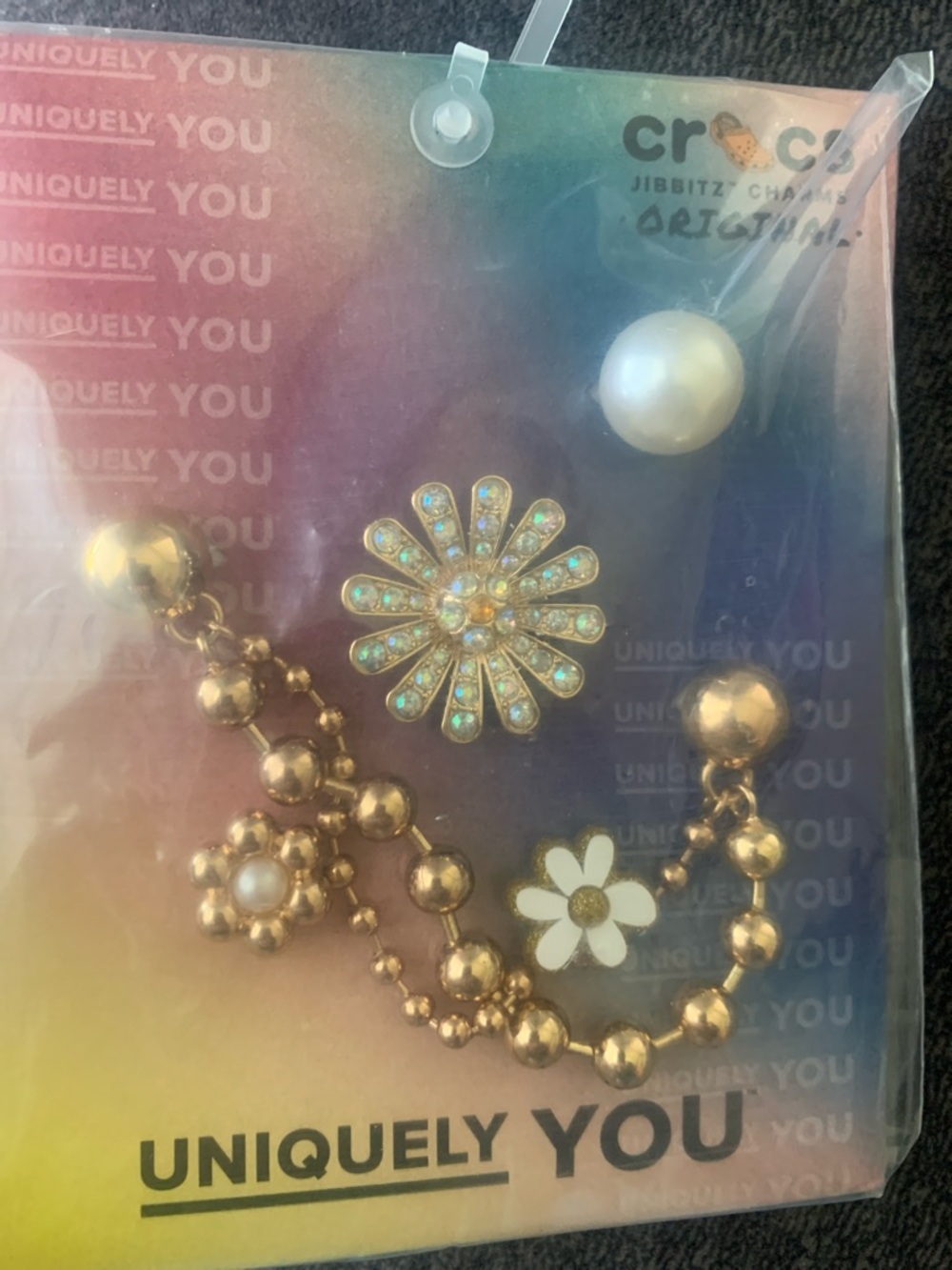 Crocs Pretty In Gold
Jibbitz Charms (5 Pack)